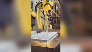 CNC Robotic Laser Cutting Machine Performs Intricate Cuts During Industrial Laser Cutting Operations