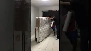 Professional Mattress Movers Show How To Wrap A Mattress Before Moving
