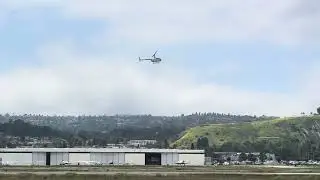Robinson R44 Helicopter taking off from Torrance Airport 