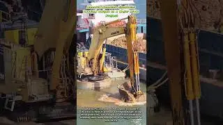 Massive Komatsu Excavator Loading Barges In A Major River Project
