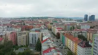 Aerial views of Brno, Czech Republic, highlight vibrant buildings along the streets, complemented by