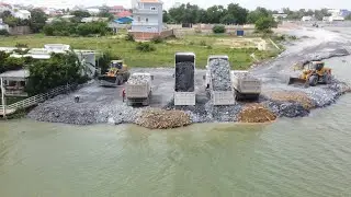 New Activities Stronger heavy dump truck unloading Stone Into the water build New Road