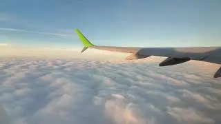 United Airlines beautiful take off over the clouds of Texas.