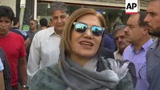 People crowd Tehran exchanges as Iran's rial rallies after weeks of falls