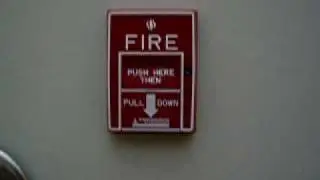 Pulling the fire alarm for a fire drill at Potomac Hall