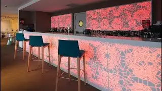 Red Color Acrylic and Corian Cashier Reception Counter Design Curved Shape Desk