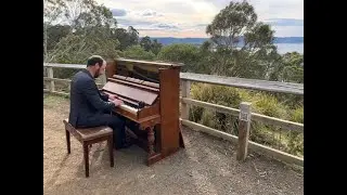 Kelvin Smith (A Piano of Tasmania) does a pop up performance at Knocklofty Reserve in West Hobart.