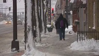 Twin Cities residents battle against - and penguin-walk across - icy surfaces