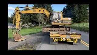 HOW TO SIDE LOAD AN EXCAVATOR ON A LOWBOY TRAILER