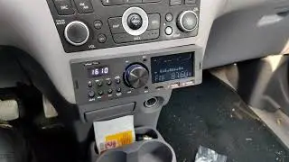 Nissan Almera Tino after market radio built in.
