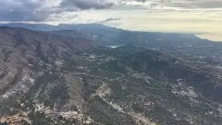 Drone Captures Tranquil Seaside Landscape, Beautiful Drone Shot Of Coastal Hills And Peaceful Waters