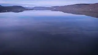 Moberly Lake in Winter | An Aerial Flight Over Open Water | North and Up Media