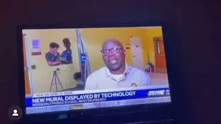 'Divine Wall Murals' Prints Student Design at Local Middle School
