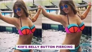 Kim Sharma flaunts belly button piercing in multi-coloured neon bikini