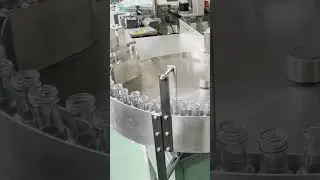 Round bottle feeding turntable