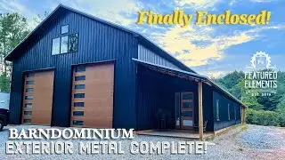 Barndominium Enclosed! Exterior Metal Complete, garage doors, and entry door are in.