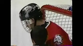 Garry Valk hits Dominik Hasek - Jan 20, 2001