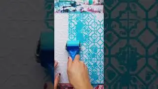 Starting a new painting with a brayer and stencils.