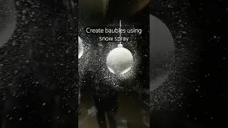 Creating baubles using snow spray #christmas #snowspray #christmassnow