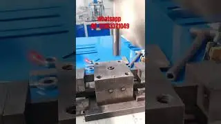 Semi-automatic feeding double-station hydraulic round pipe punching machine, made in China.