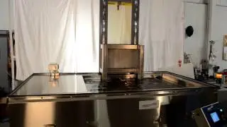 SharperTek Ultrasonic injection mold cleaner with power lift arm