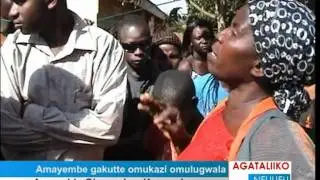 Amayembe gakutte omukazi omulugwala