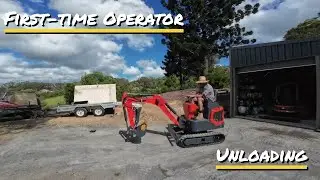 Unloading a mini ex cw12s 