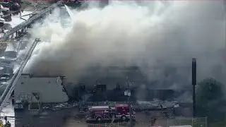 Massive fire burns at commercial building in north Houston