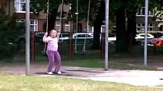 Nat playing on swings