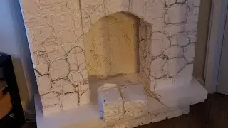 #DIY FIRE PLACE...CHRISTMAS VILLAGE ON TOP. ELF'S HOME at the bottom of the fireplace.. #Christmas