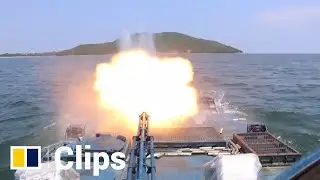 Chinese amphibious armoured troops conduct live-fire military exercise at sea