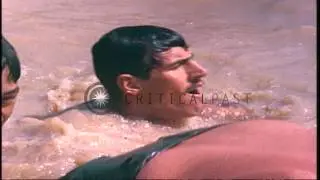 Soldiers of 5th Battalion 12th Infantry 199th Light Infantry Brigade swim in a wa...HD Stock Footage