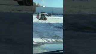 Skid steer snow pusher