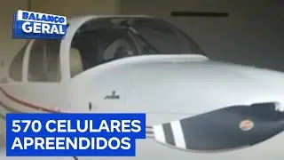 Piloto e ajudante s&atilde;o presos com mais de 500 celulares