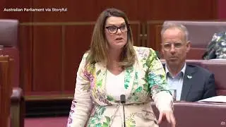 Australian senator holds up dead salmon during Parliament debate