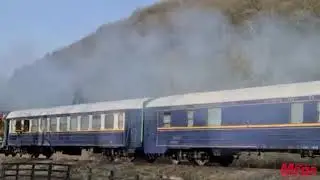Tom Cruise filming stunt scenes on top of a moving train in Yorkshire, England