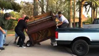 Loading the piano onto the truck