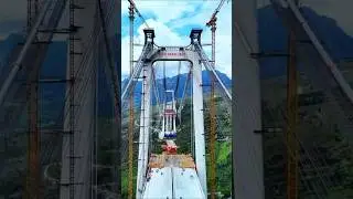 Large scale lifting of Tianmen Bridge begins #technology #infrastructure #bridge #road #mountains