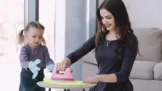 Beautiful Women Ironing While Her Child Playing - Free Cinematic 4K No Copyright Stock Footage