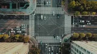 Video Pediaa - Traffic On An Intersection Road In A City (4K) | No Copyright