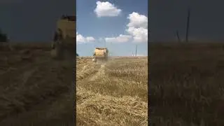 NEW HOLLAND TC 56 HARVESTER