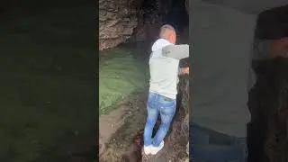 Man Falls Into Water While Trying to Enter Cave - 1670379
