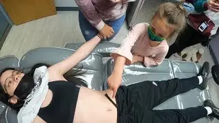 Lower navel piercing for Addison