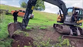 Repairing fences and unblocking a culvert on the farm