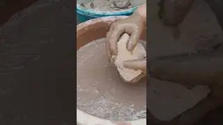 soft mud crumbling in water