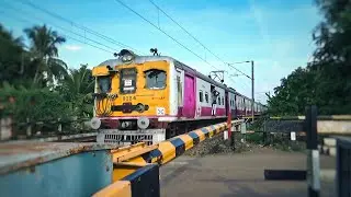 Vintage model 🚂 staff special EMU train swiftly passing🚦level crossing and people are waiting