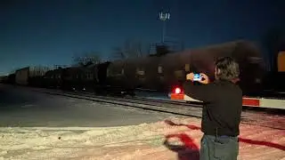 A 10,000 ft NS manifest train with a mid-train DPU.