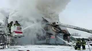 GR Fire Department on scene building fire, it was well involved and compromised upon arrival.