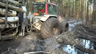 Valtra forestry tractor  in mud, difficult conditions