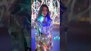 Futuristic Elegance: Holographic Fashion in a Neon Cityscape